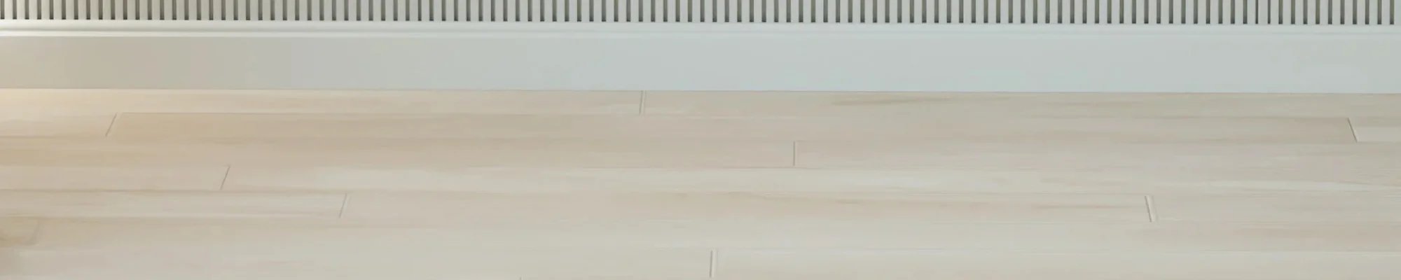 Light baseboards and flooring in a modern South Jersey home