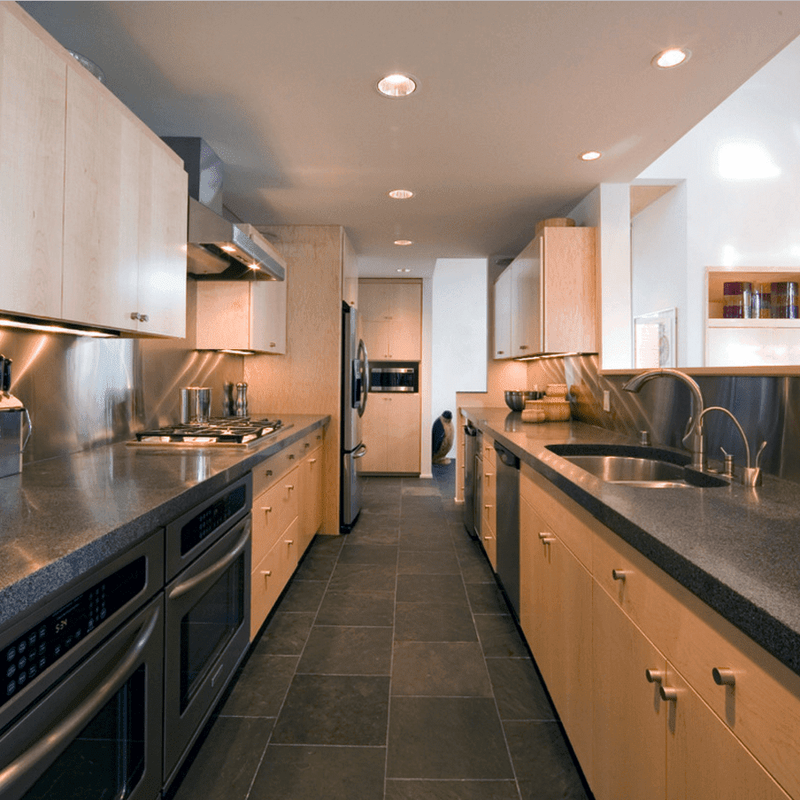 Residential tile flooring installation in kitchen